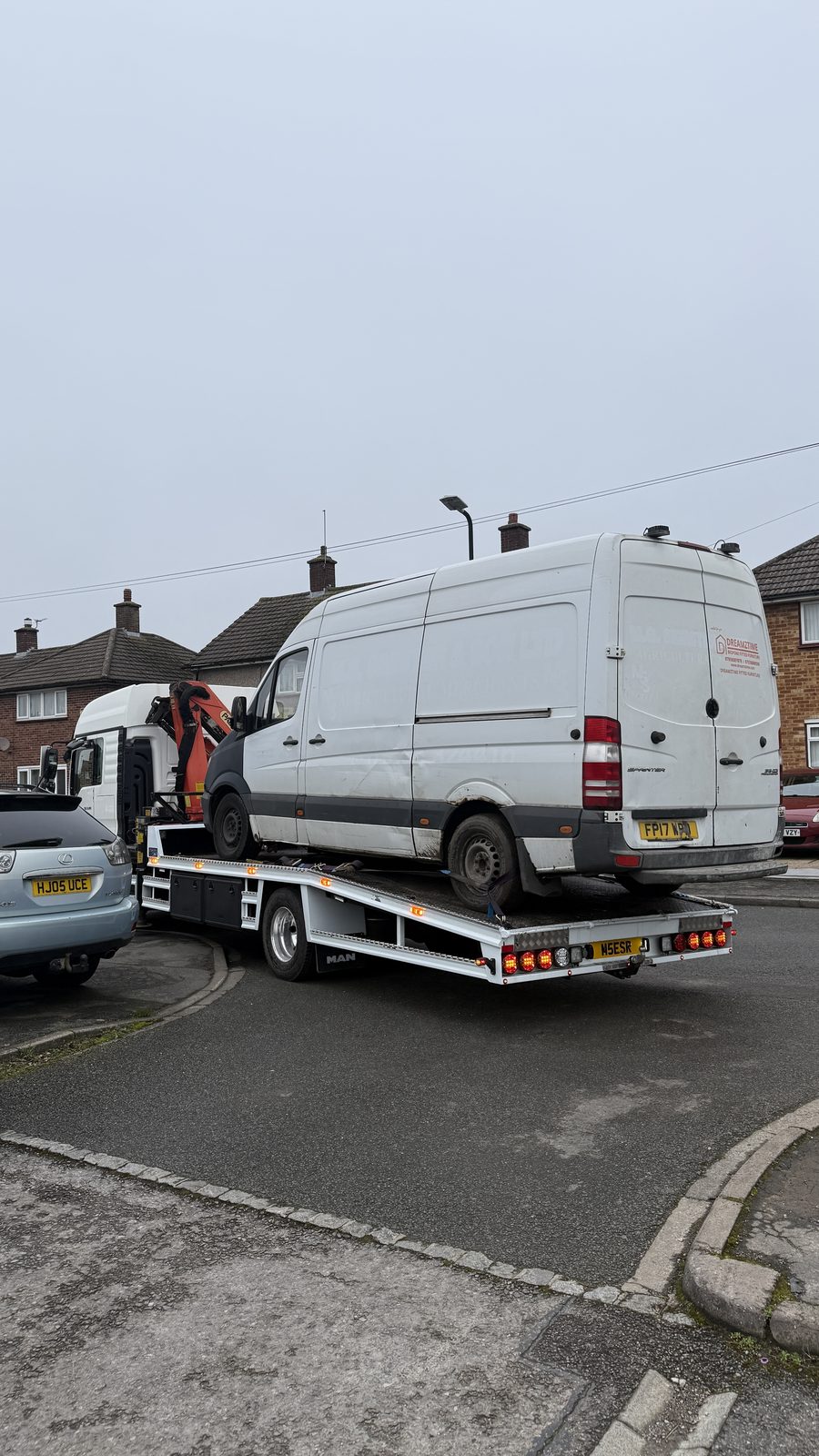 Sprinter van loaded on recovery flatbed in Slough
